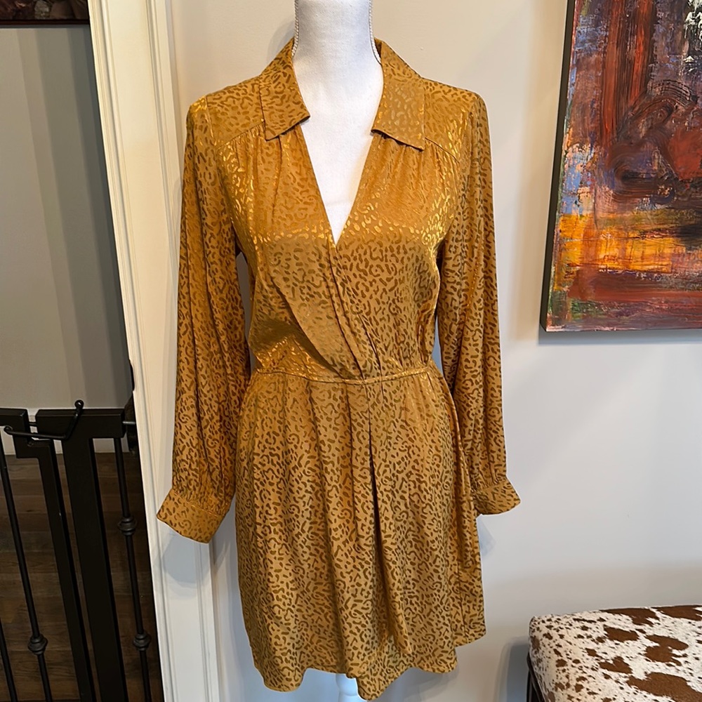 Cute Gold-ish dress. Perfect for any occasion. Never been worn! NWT